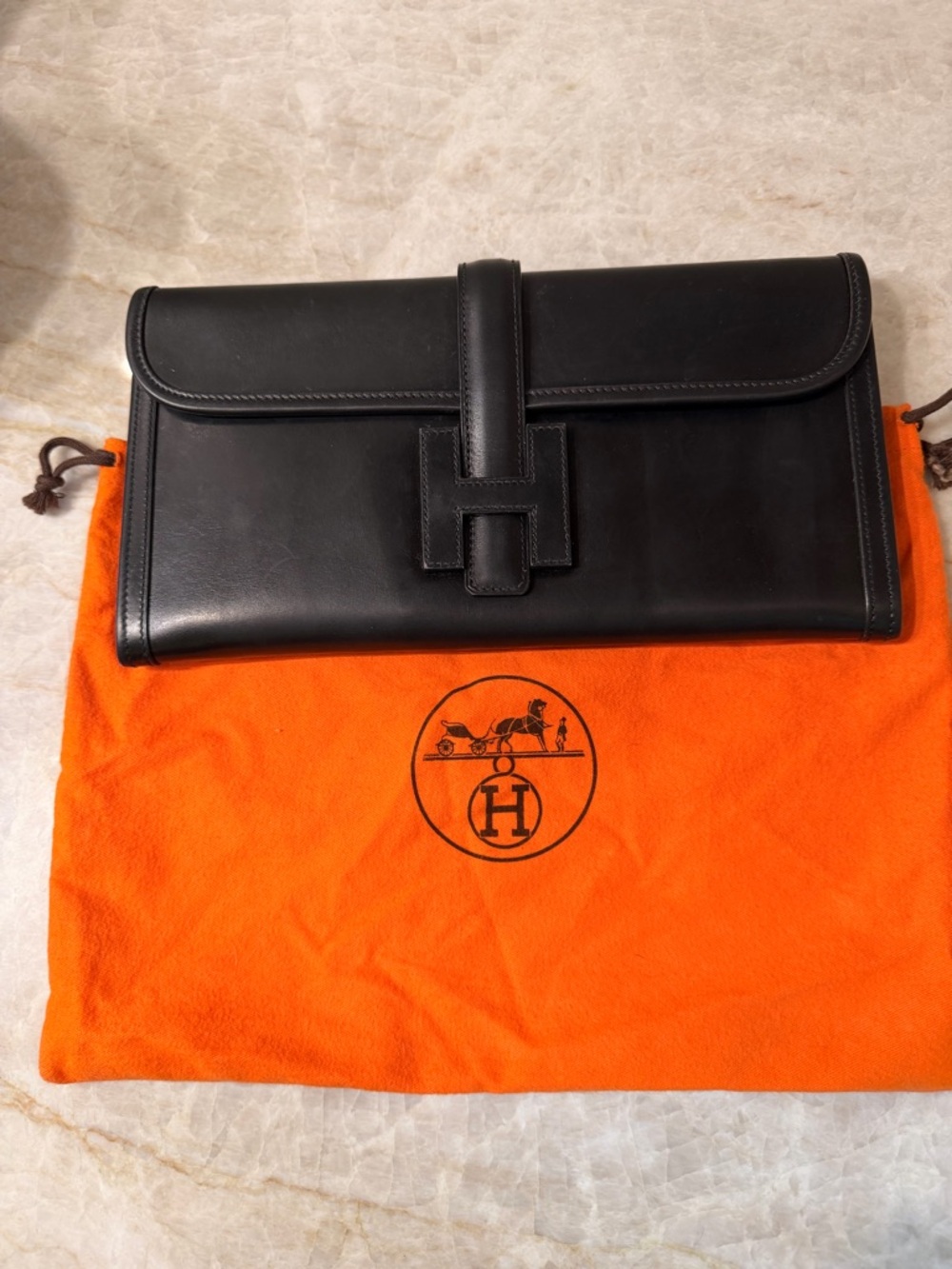 Authentic Vintage Hermès Jige Elan 29 clutch in black leather.